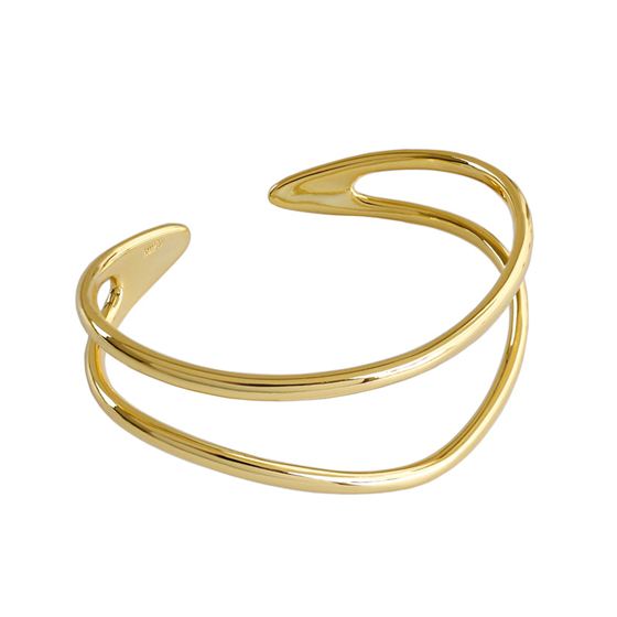 Gold bracelet on a white background