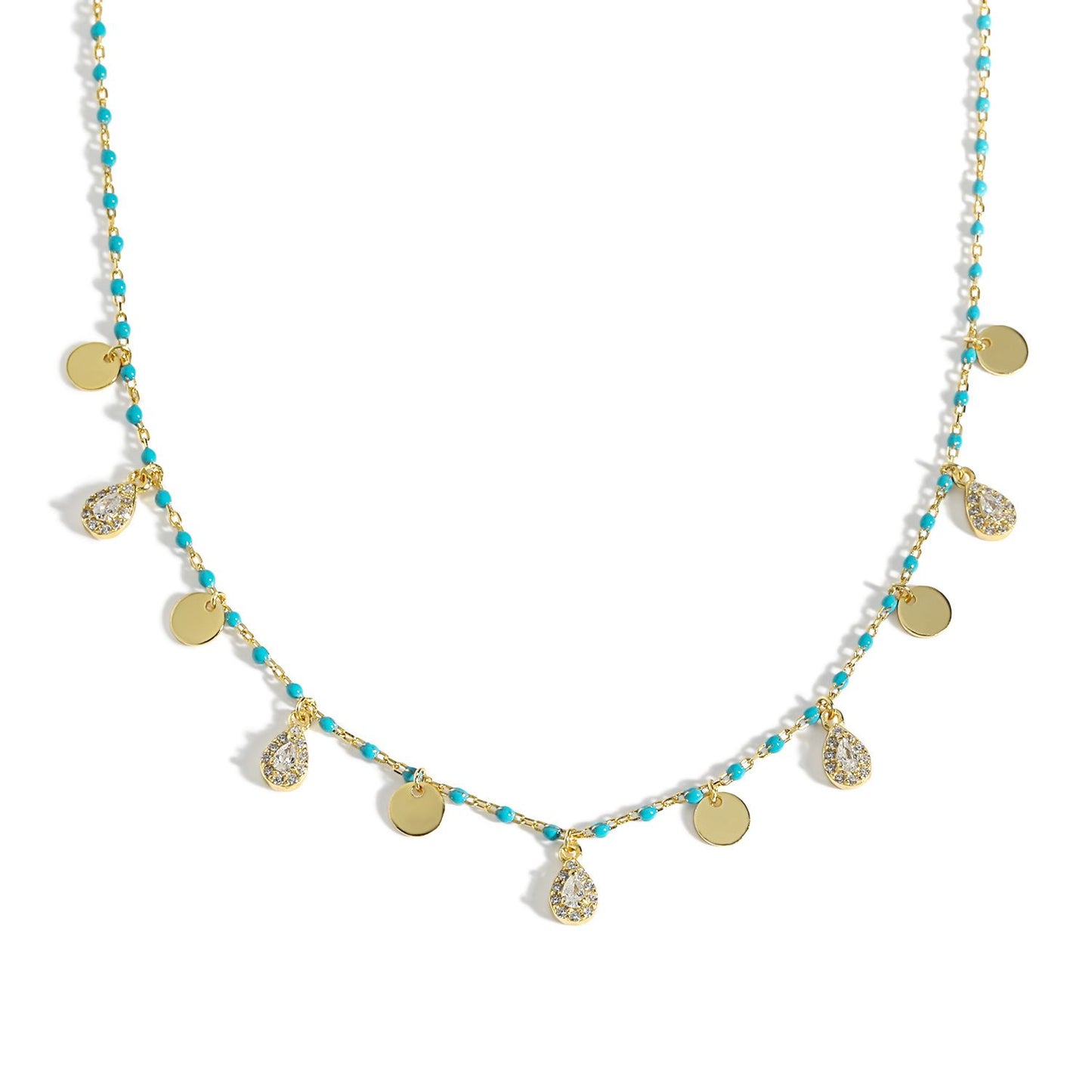 Necklace with gold and turquoise beads on a white background