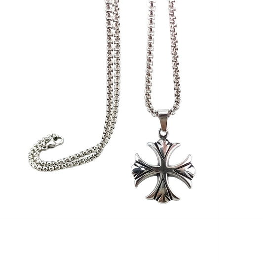 Silver cross pendant necklace on a white background