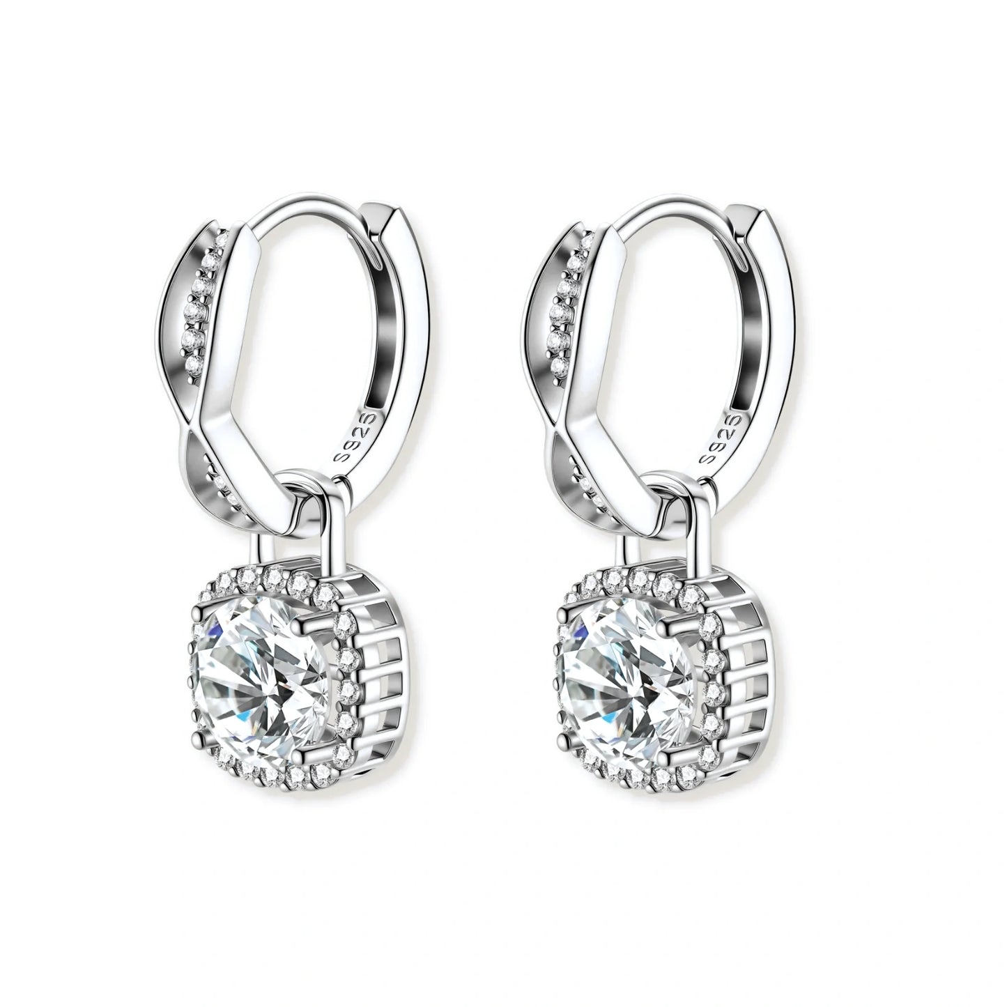 Sterling silver twisted hoop earrings with round moissanite stones in halo settings against neutral background.