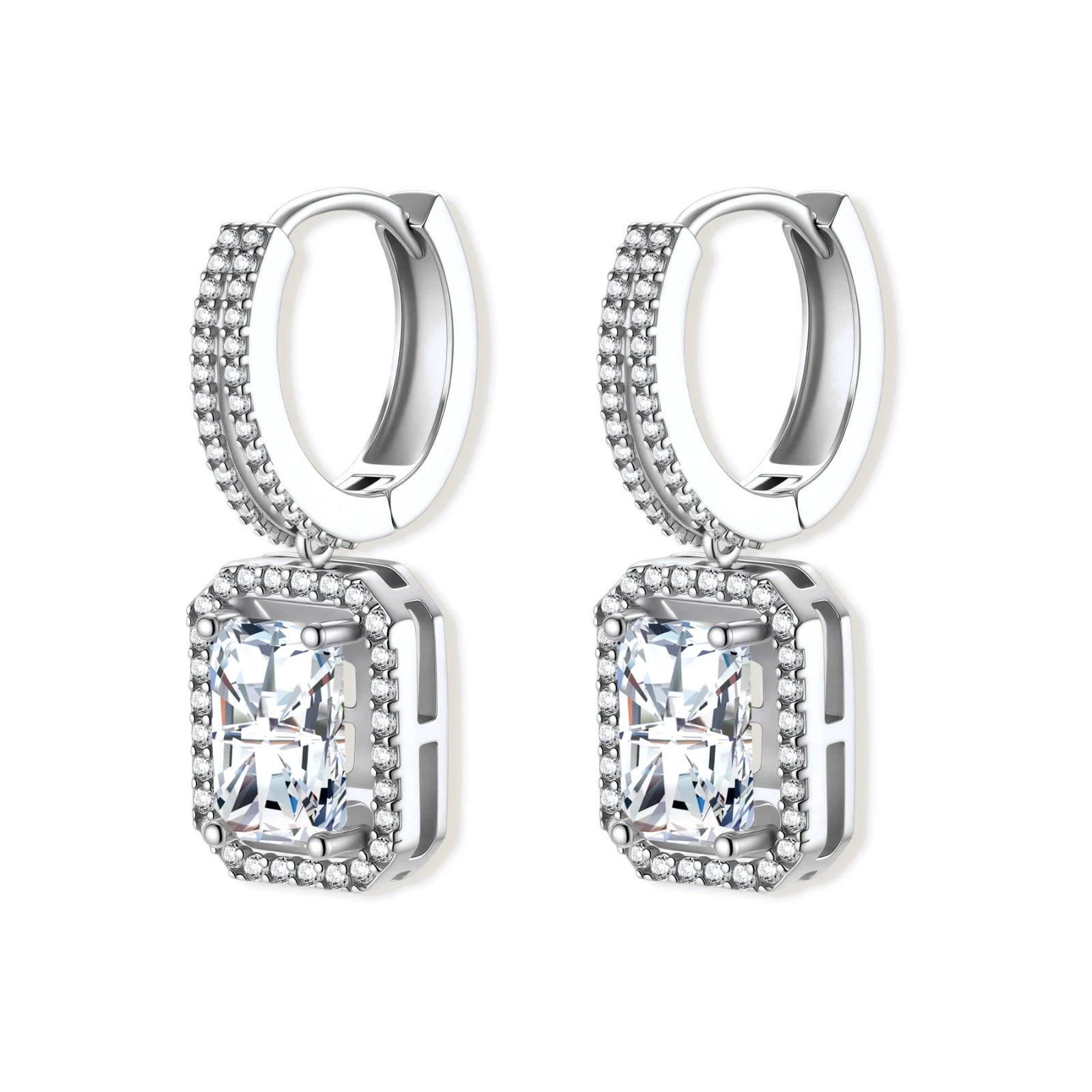 Sterling silver huggie hoops with emerald-cut moissanite drops featuring pavé-set crystals on white background.