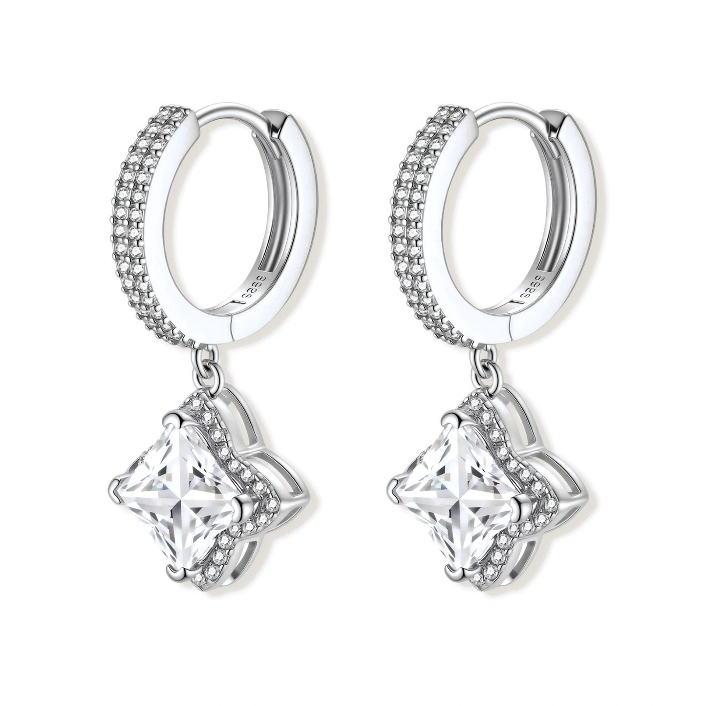 Sterling silver huggie hoops with geometric diamond-shaped moissanite dangles featuring pavé crystal details