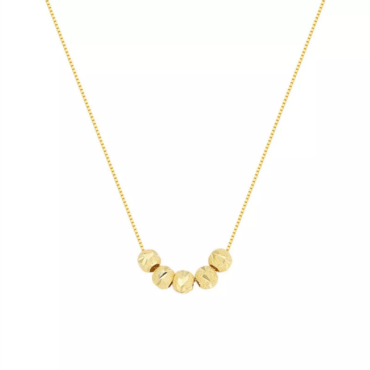 Gold necklace with beaded design on a white background