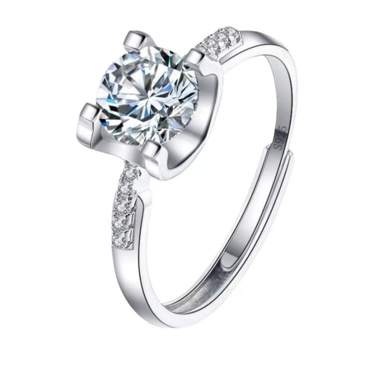 Silver ring with a large diamond and smaller diamonds on the band against a white background