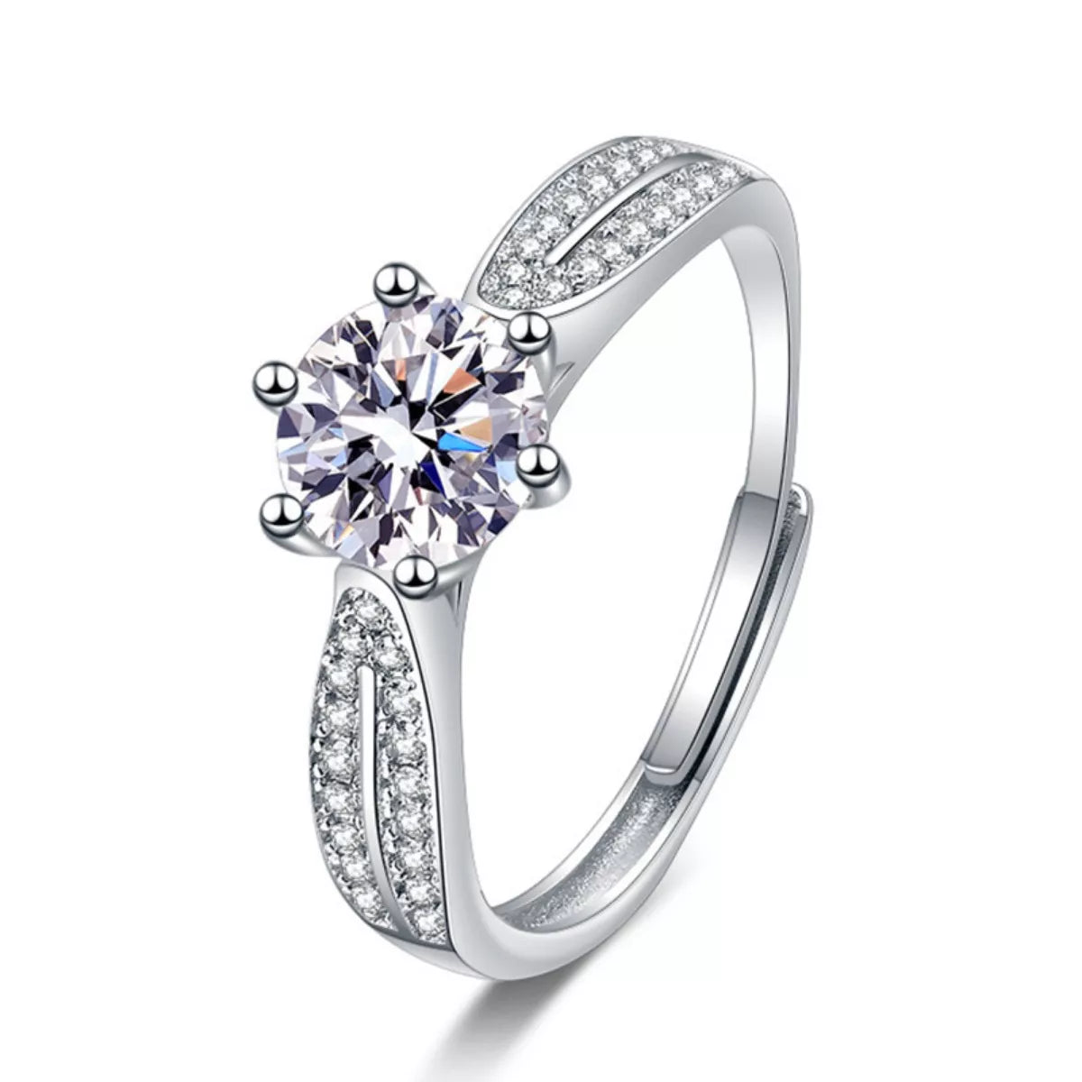 Silver ring with a large central gemstone and smaller stones on a white background