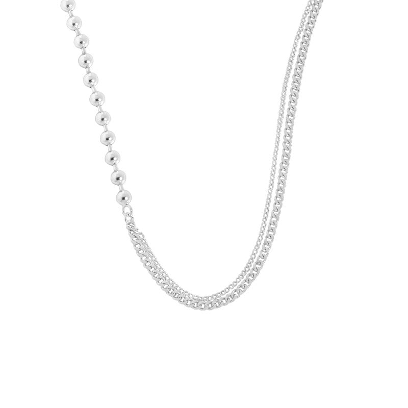 Silver chain necklace on a white background