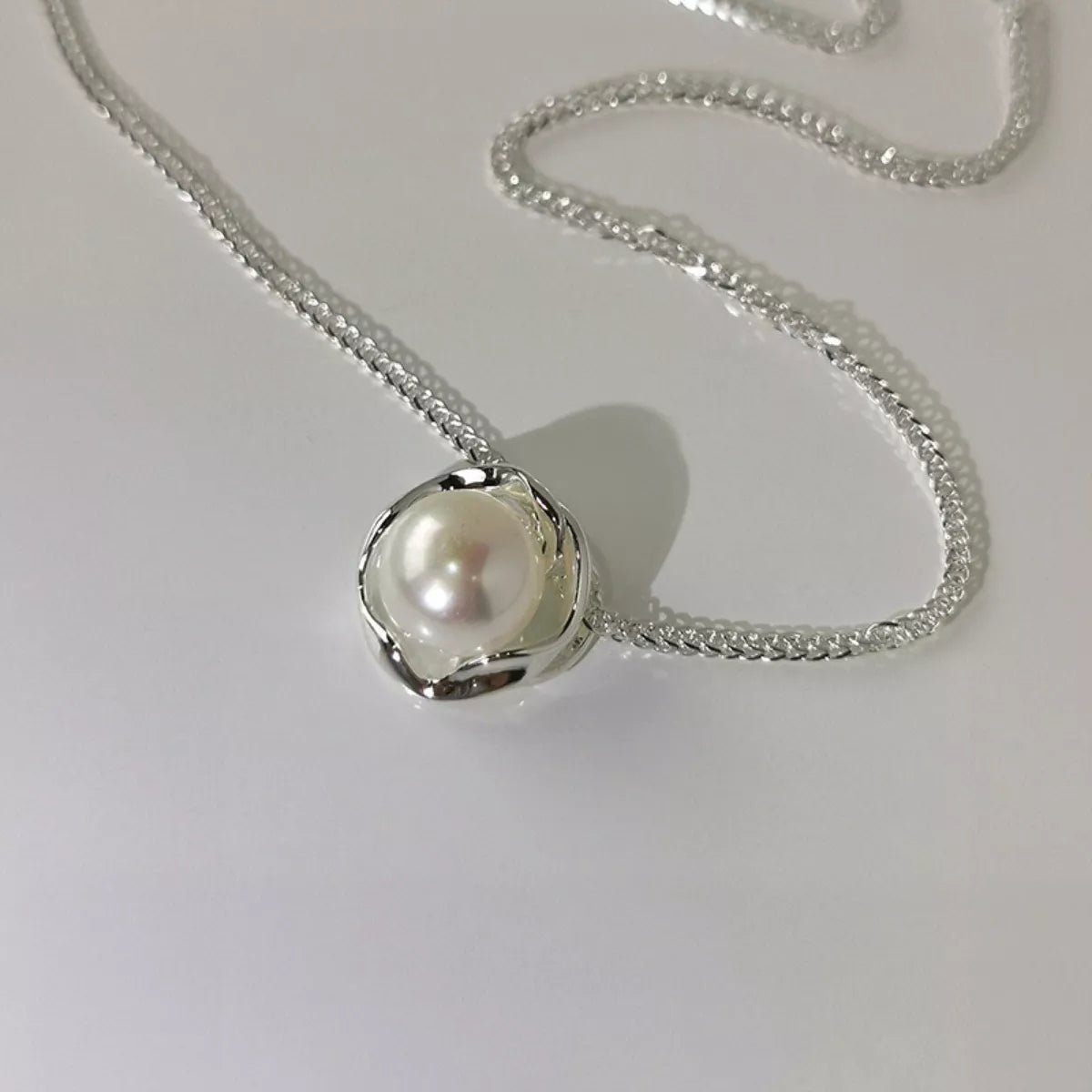 Pearl necklace on a white background