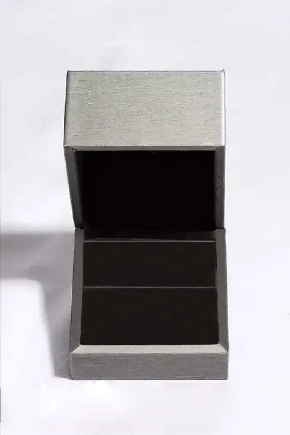 Silver jewelry box with a black interior on a white background