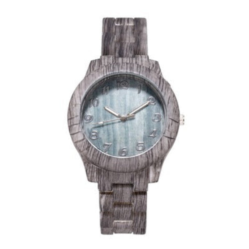 Wooden watch with a textured strap and light blue face on a white background