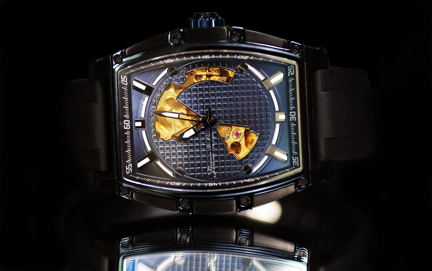 Luxury watch with intricate design on a dark background