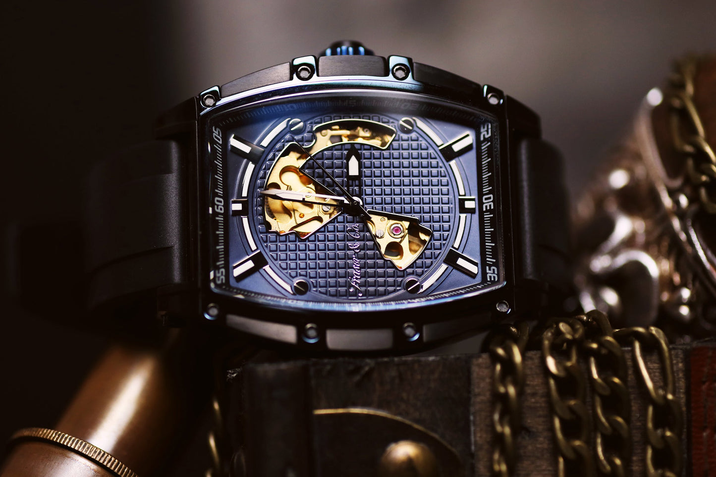 Luxury watch with gold accents on a dark background
