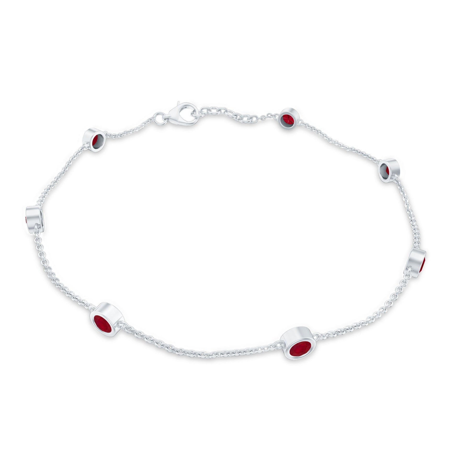Silver bracelet with red stones on a white background