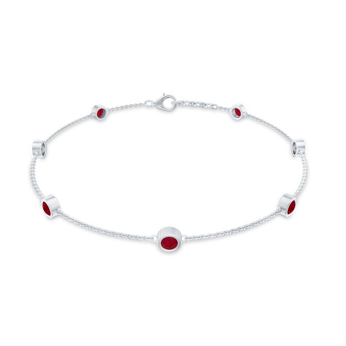 Silver bracelet with red stones on a white background