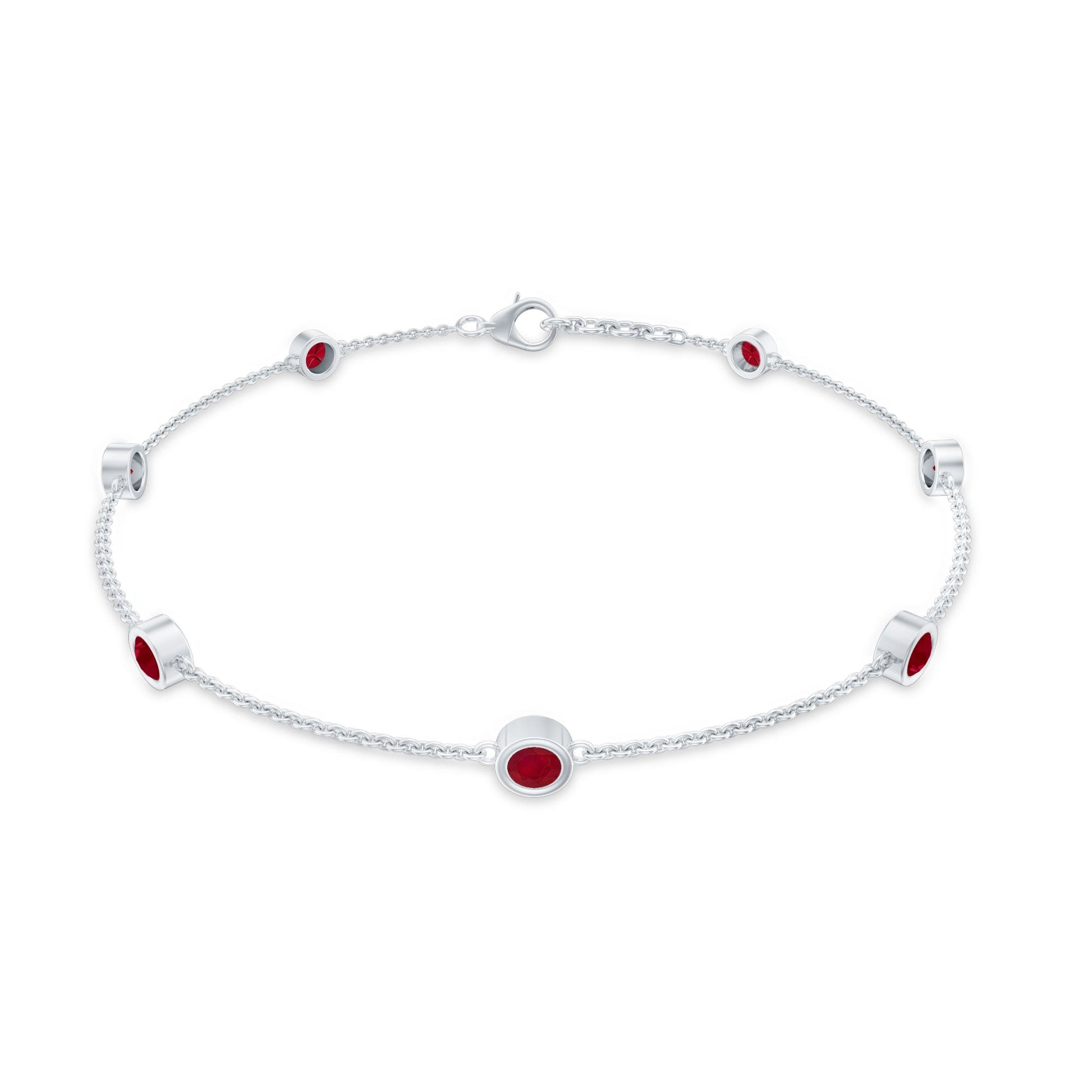 Silver bracelet with red stones on a white background
