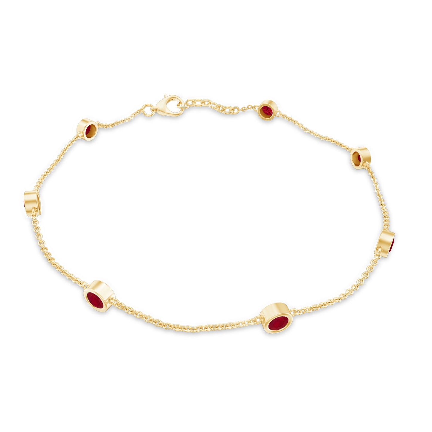 Gold bracelet with red gemstones on a white background