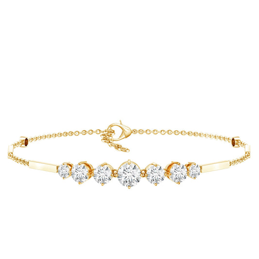 Gold bracelet with clear gemstones on a white background