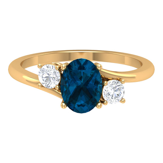 6X8mm Oval Cut London Blue Topaz Three Stone Engagement Ring with Diamond
