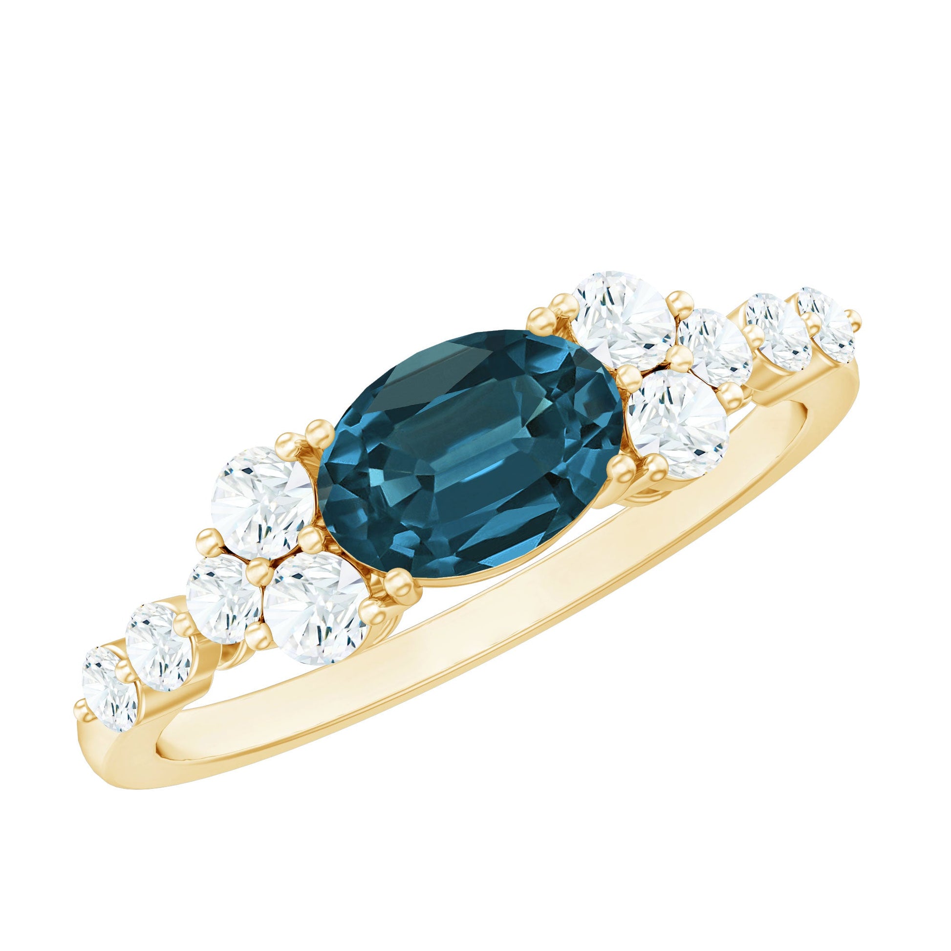 Gold ring with a blue gemstone and clear diamonds on a white background