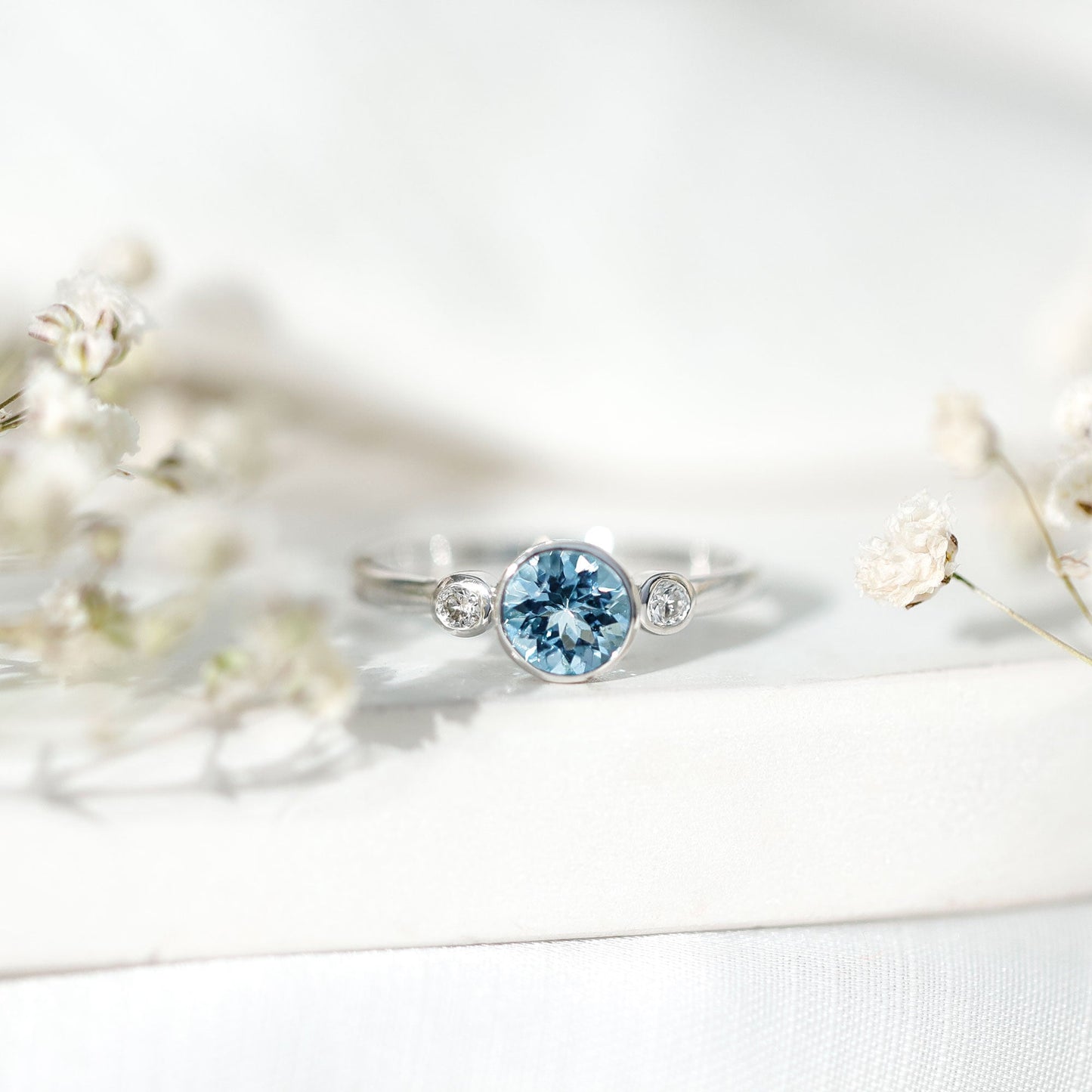 Bezel Set Aquamarine Solitaire Engagement Ring with Diamond