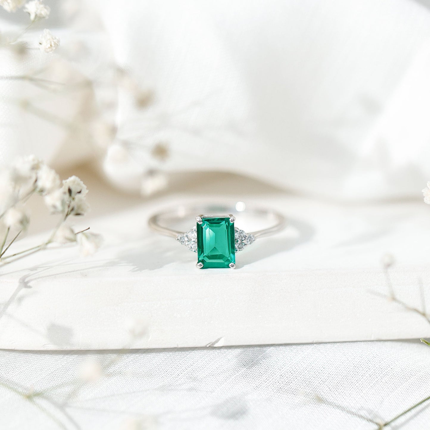 Certified 6X8 mm Lab Grown Emerald Cut Emerald Engagement Ring with Diamond Trio