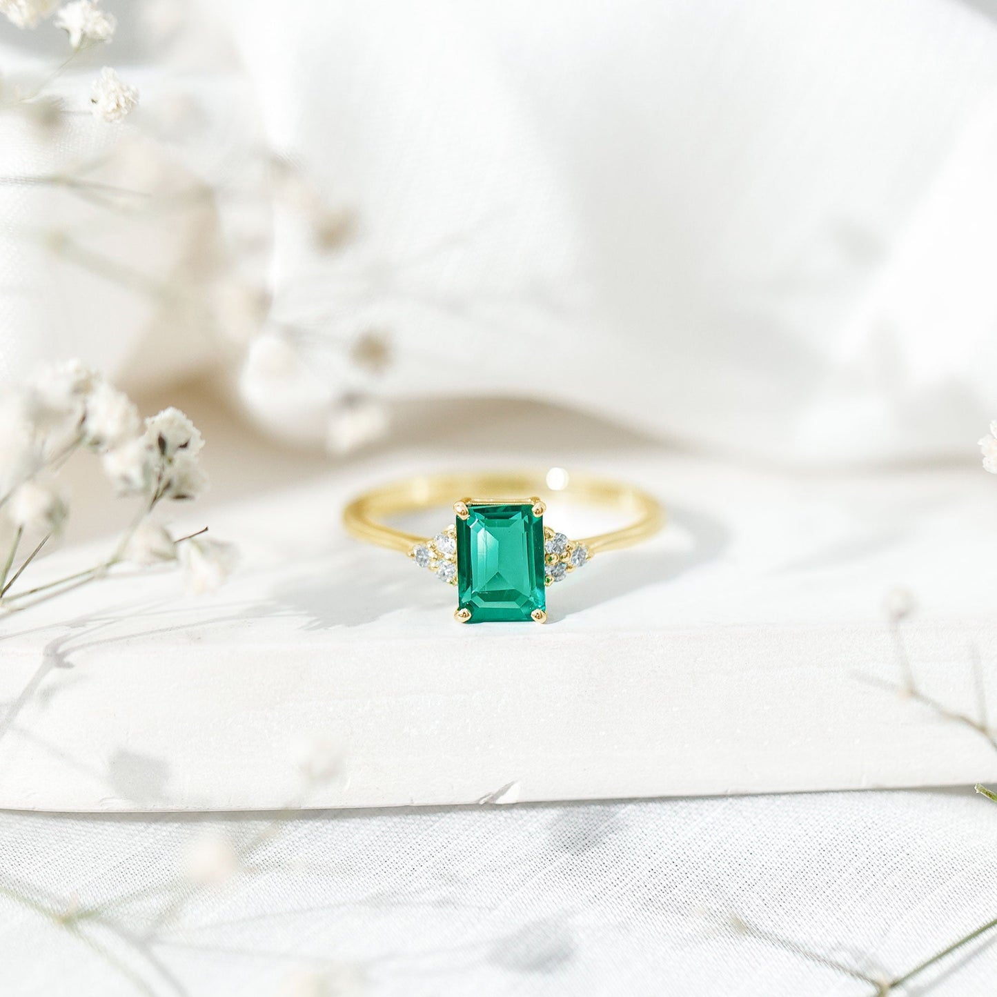 Certified 6X8 mm Lab Grown Emerald Cut Emerald Engagement Ring with Diamond Trio