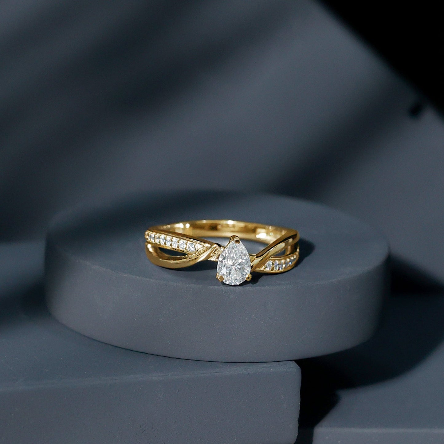 Pear Shaped Moissanite Infinity Engagement Ring