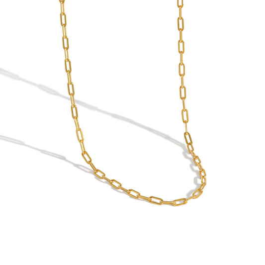 Gold chain necklace on a white background