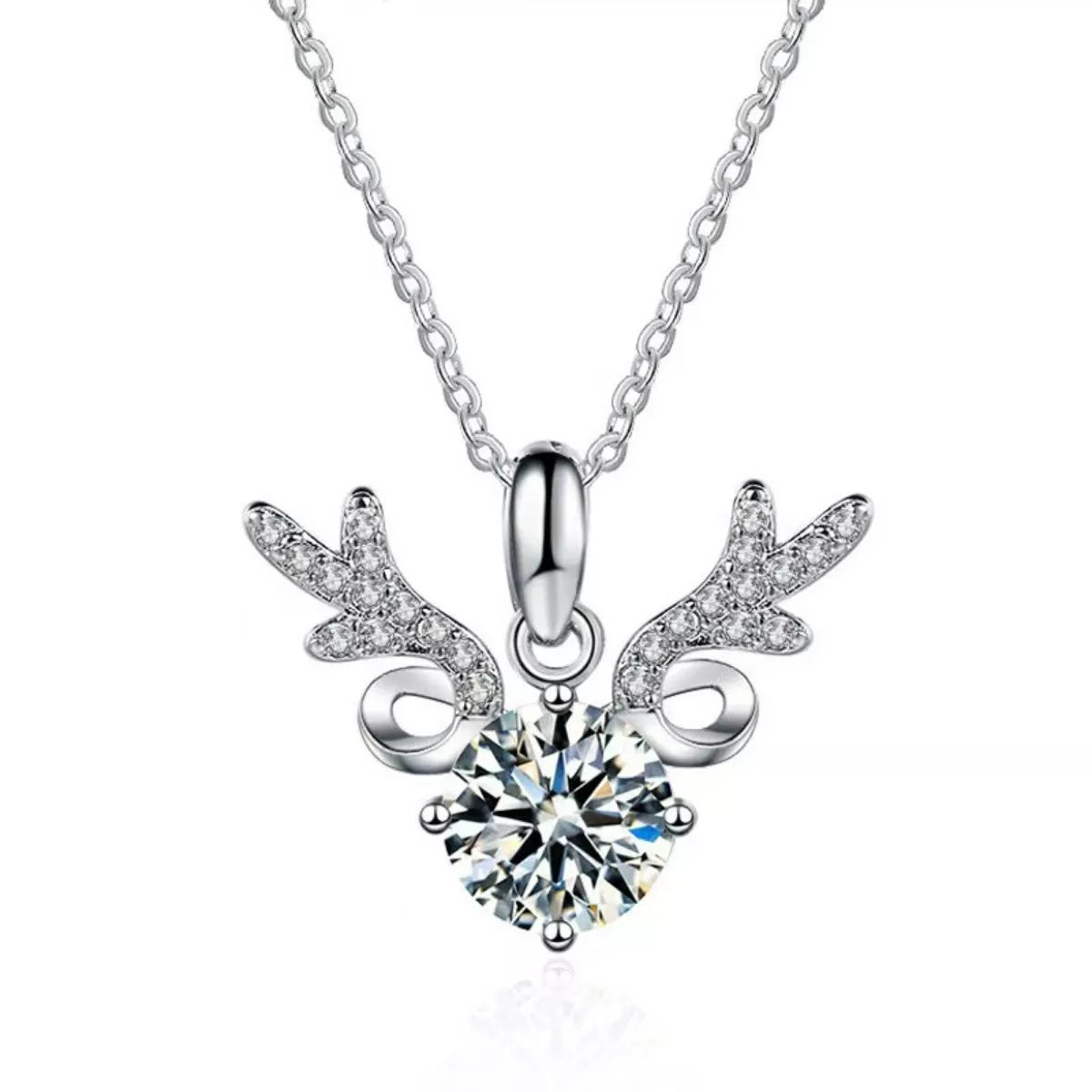 Silver necklace with a heart-shaped diamond pendant on a white background