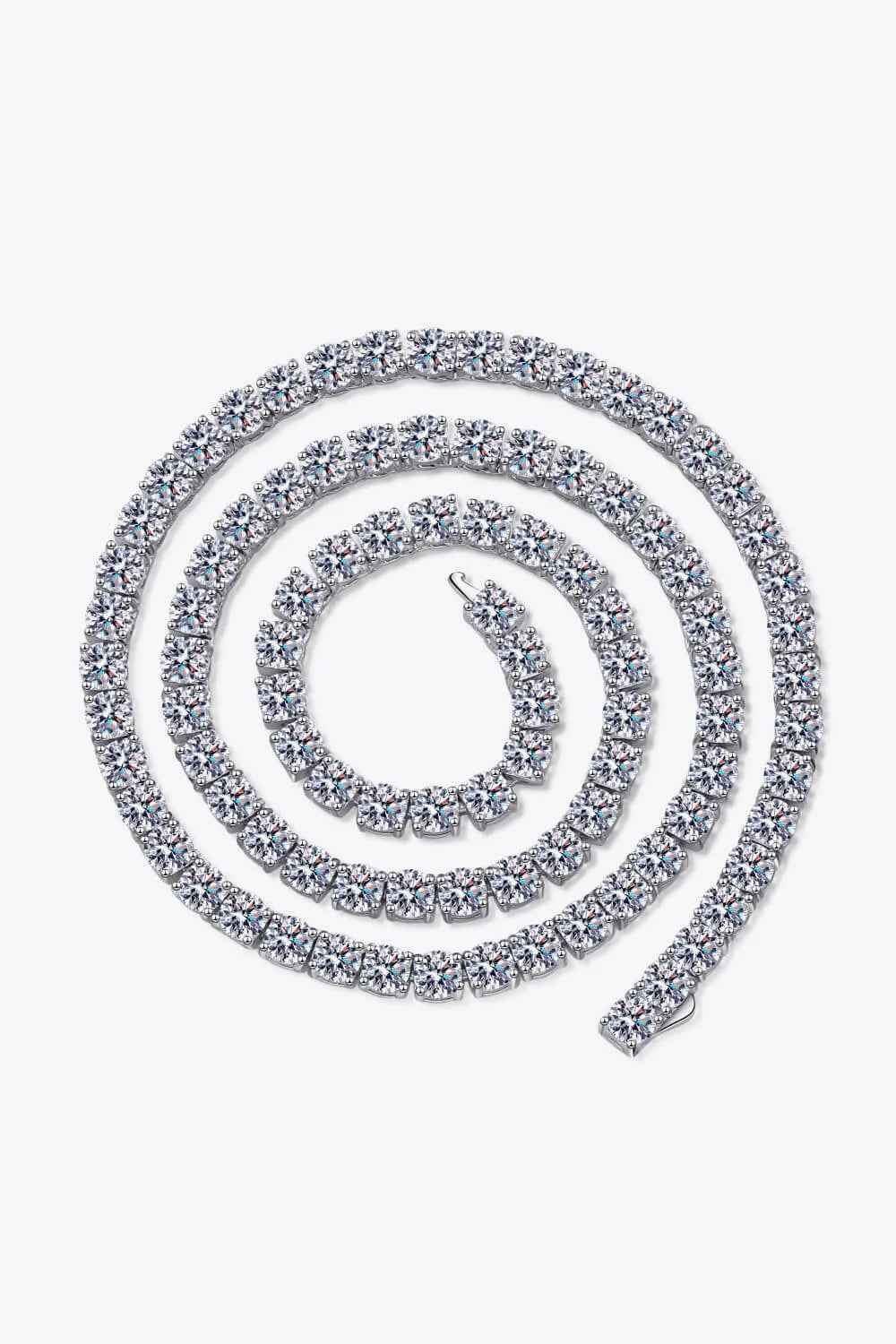Silver necklace with clear stones on a white background