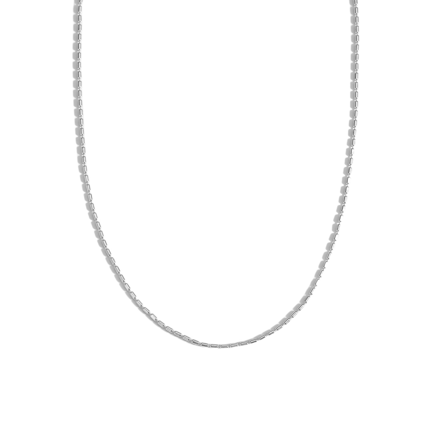 Silver chain necklace on a white background