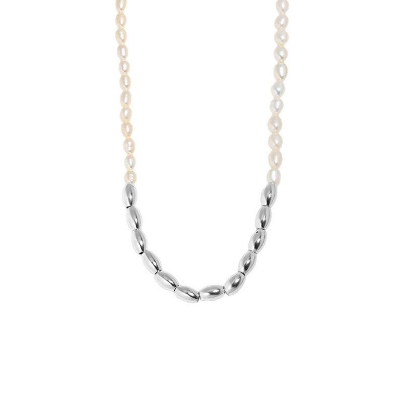 Silver necklace with a white background