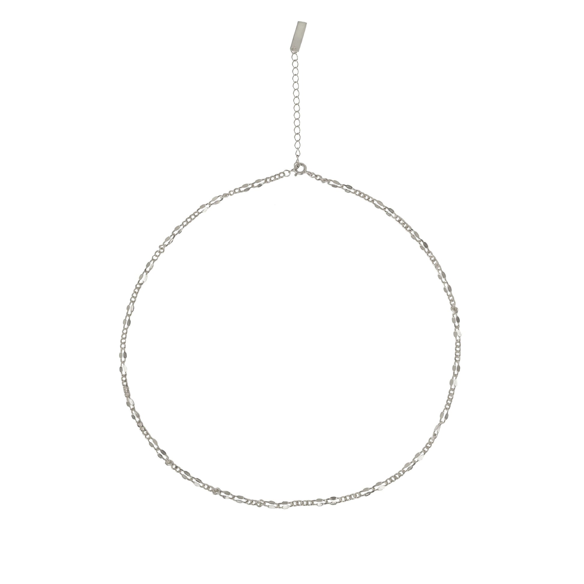 Silver chain necklace on a white background
