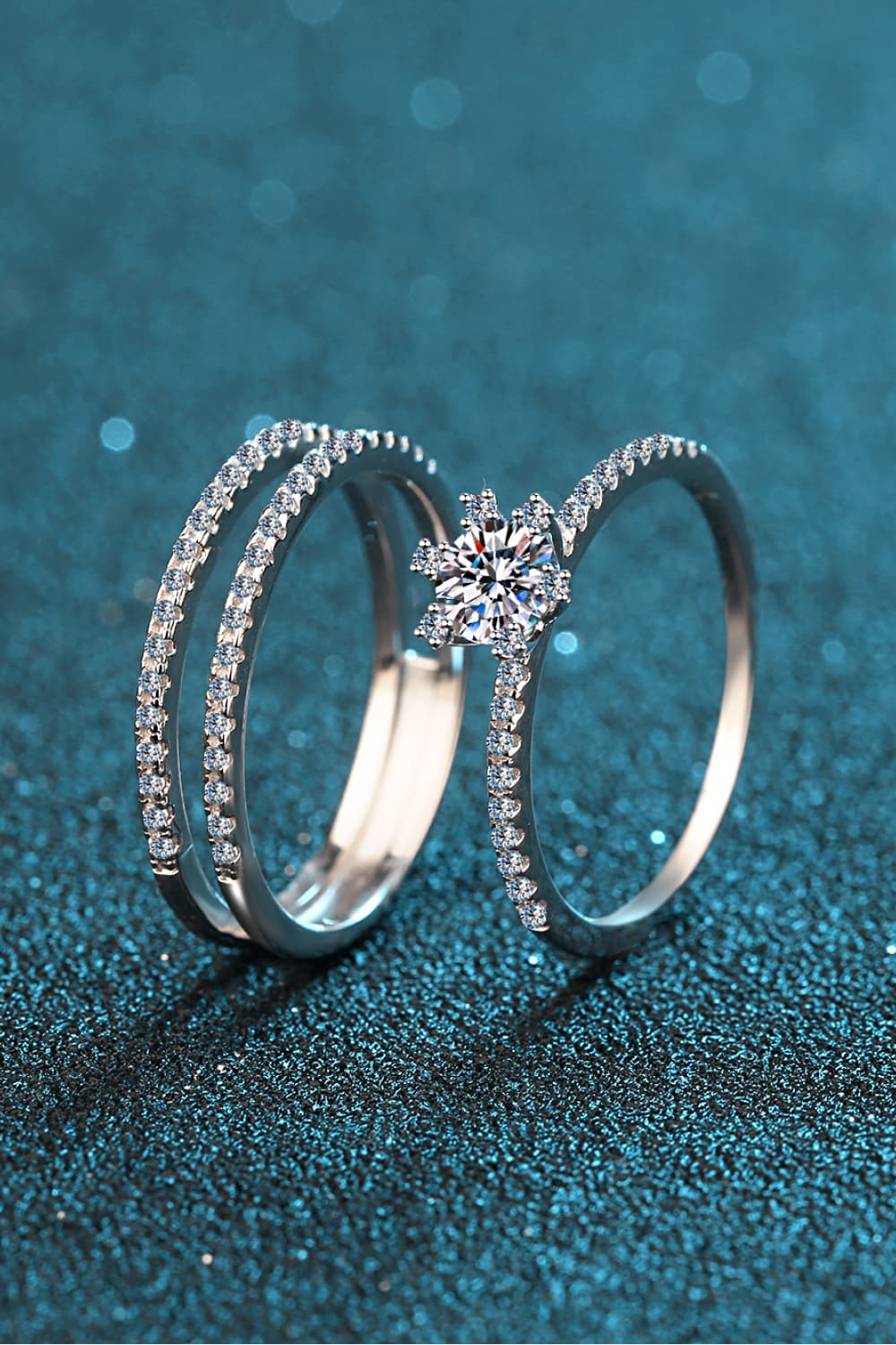 Close-up of a 0.5 Carat Moissanite Solitaire Ring and matching chevron accent band in 925 sterling silver | Le'Var Neilson Jewelry