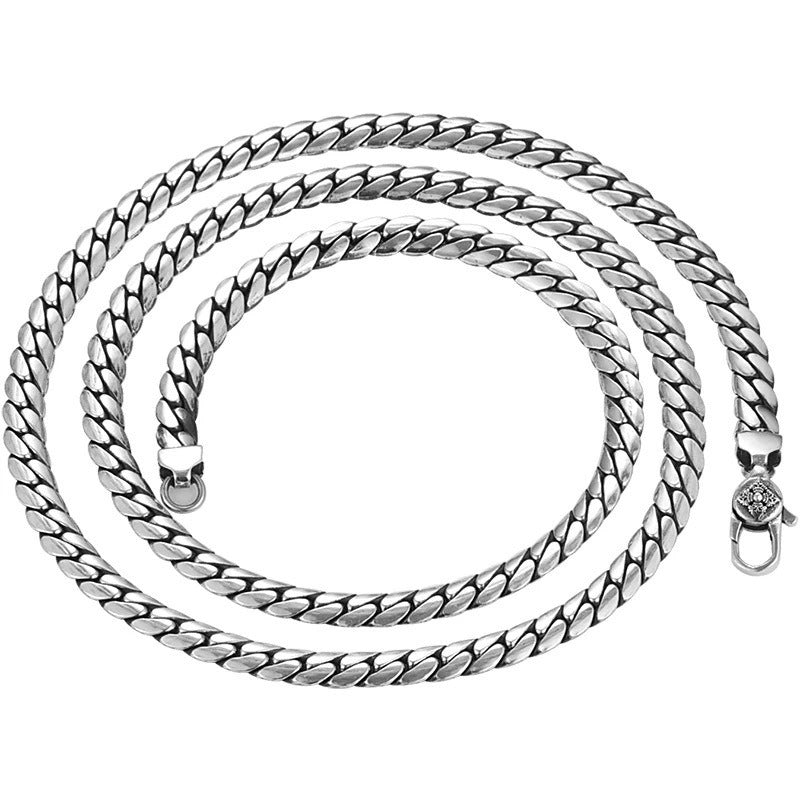Silver chain necklace on a white background