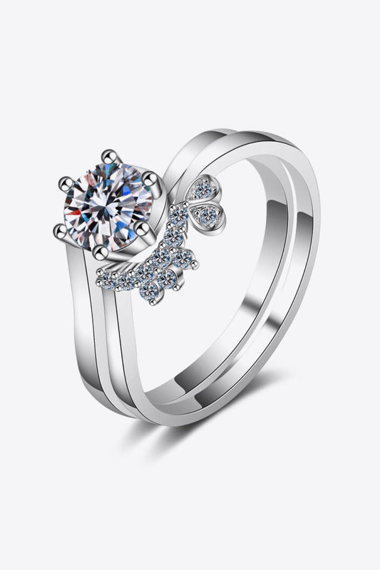 Close-up of a Moissanite Rhodium-Plated Two-Piece Ring Set in 925 sterling silver featuring an 80-point round center stone and a zircon-accented crown band stacked together | Le'Var Neilson Jewelry