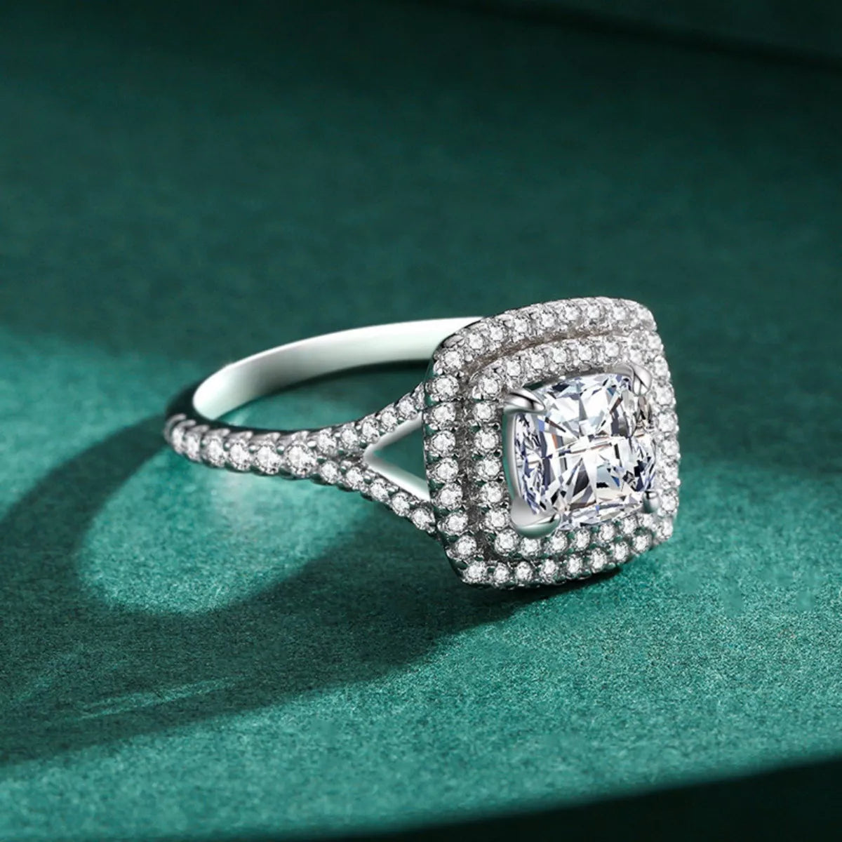Diamond ring with a green background