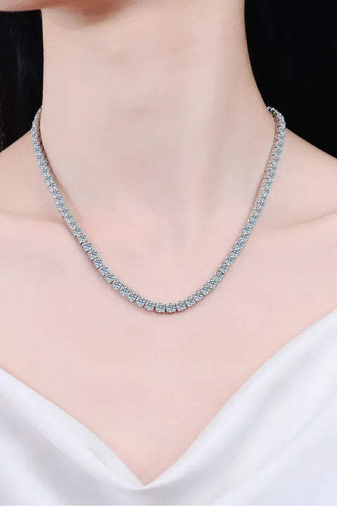 Necklace with blue stones on a mannequin with a white top