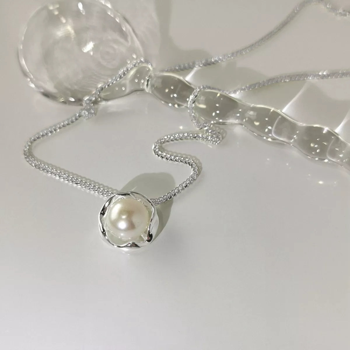 Pearl necklace on a white background