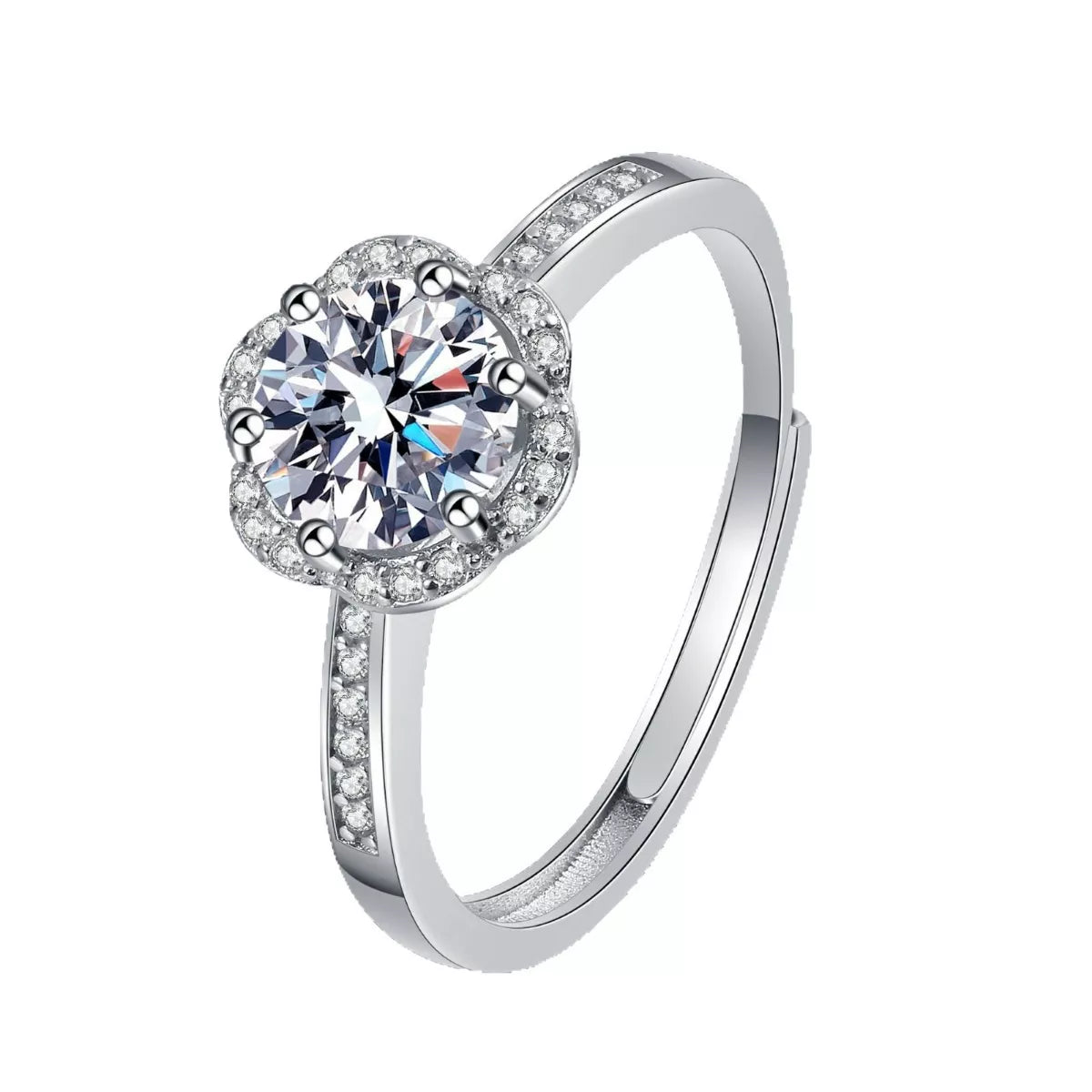 Silver ring with a large central gemstone and smaller stones on a white background