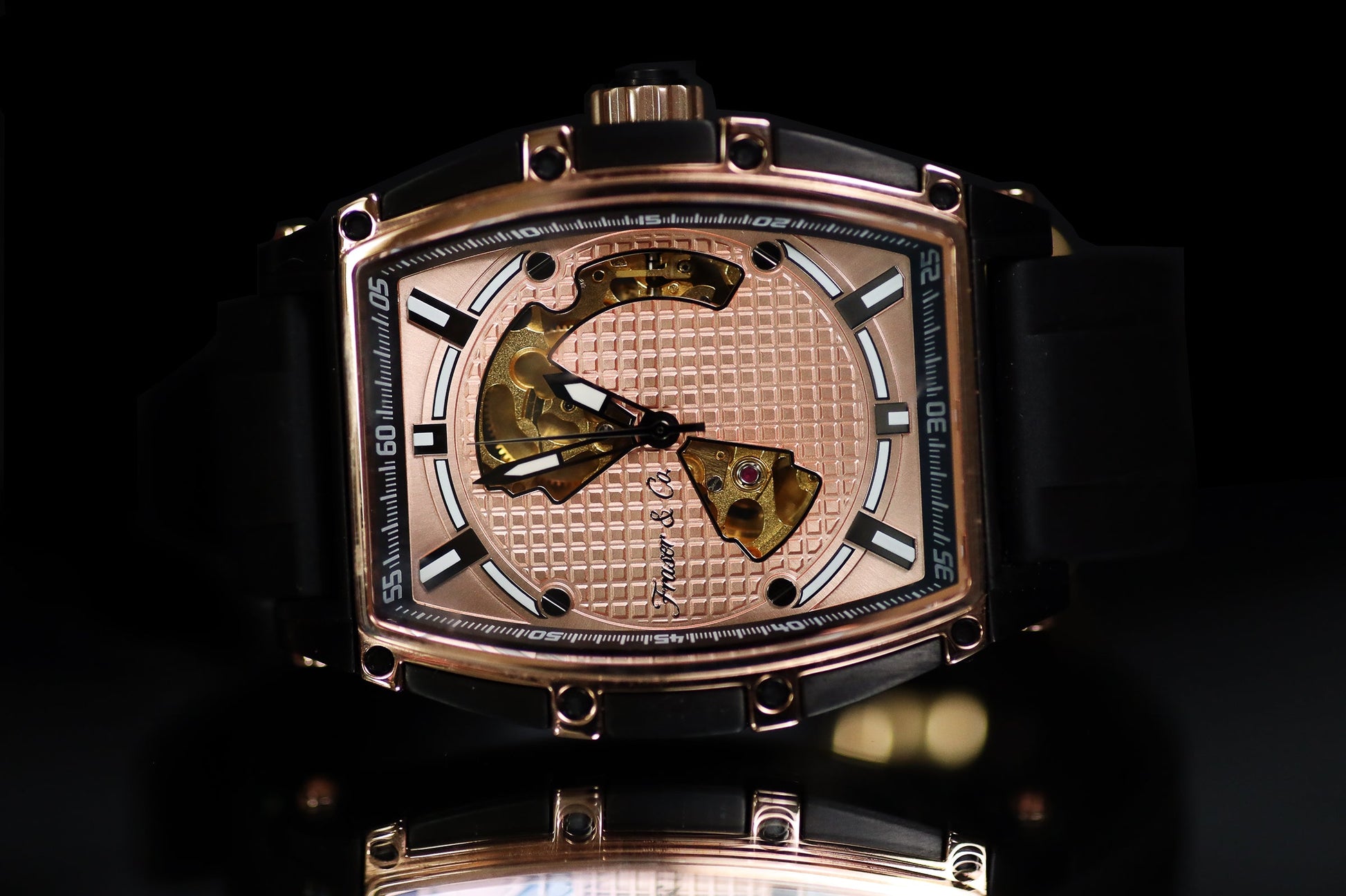 Luxury watch with intricate design on a dark background